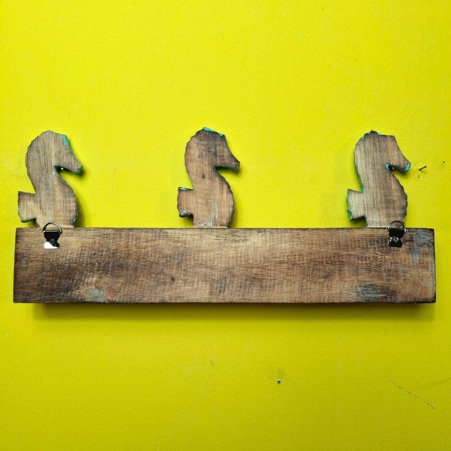 Ethnic seahorse coat hanger