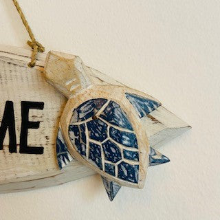 Cartello di benvenuto in legno con tartarughe