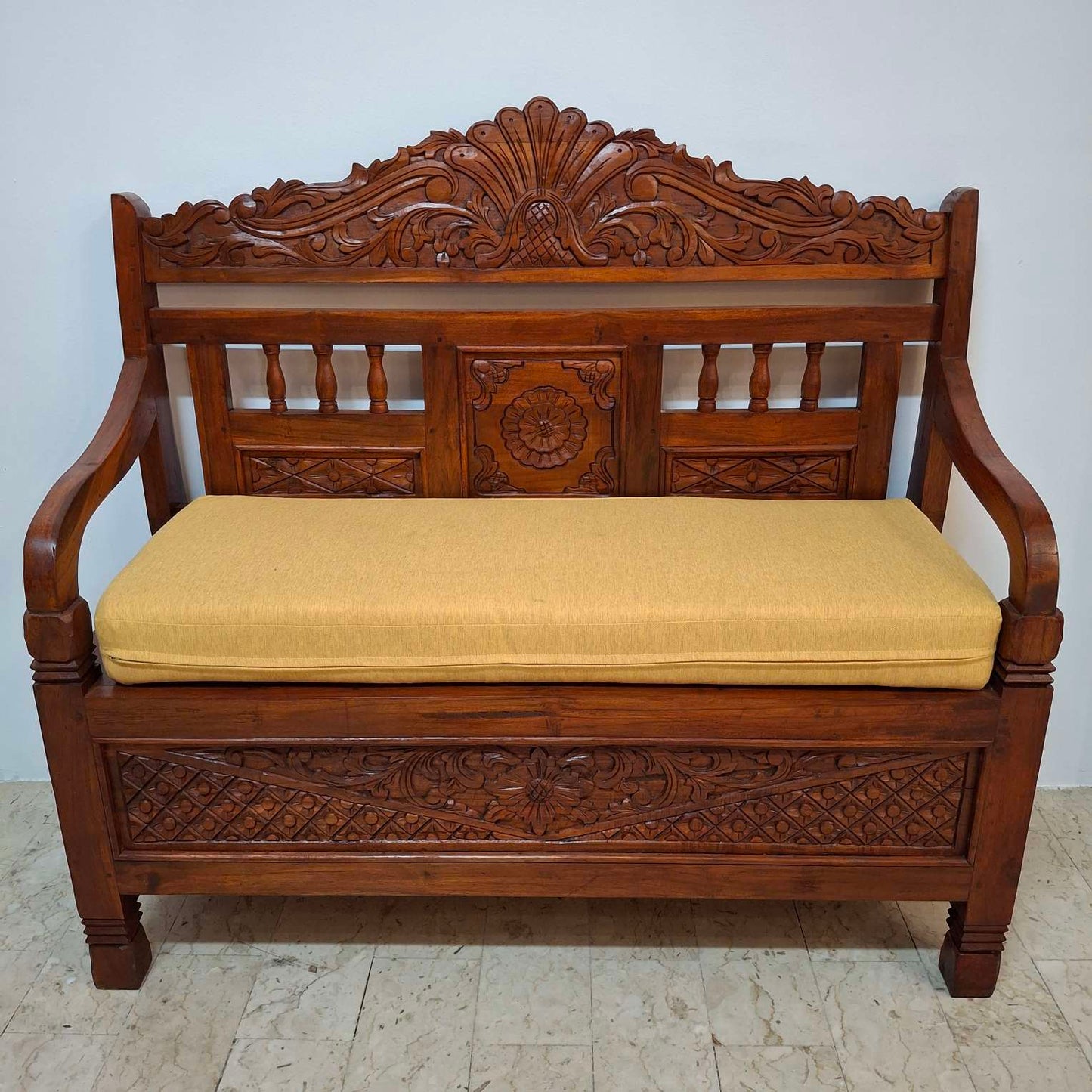 Ethnic sofa armchair with floral carvings