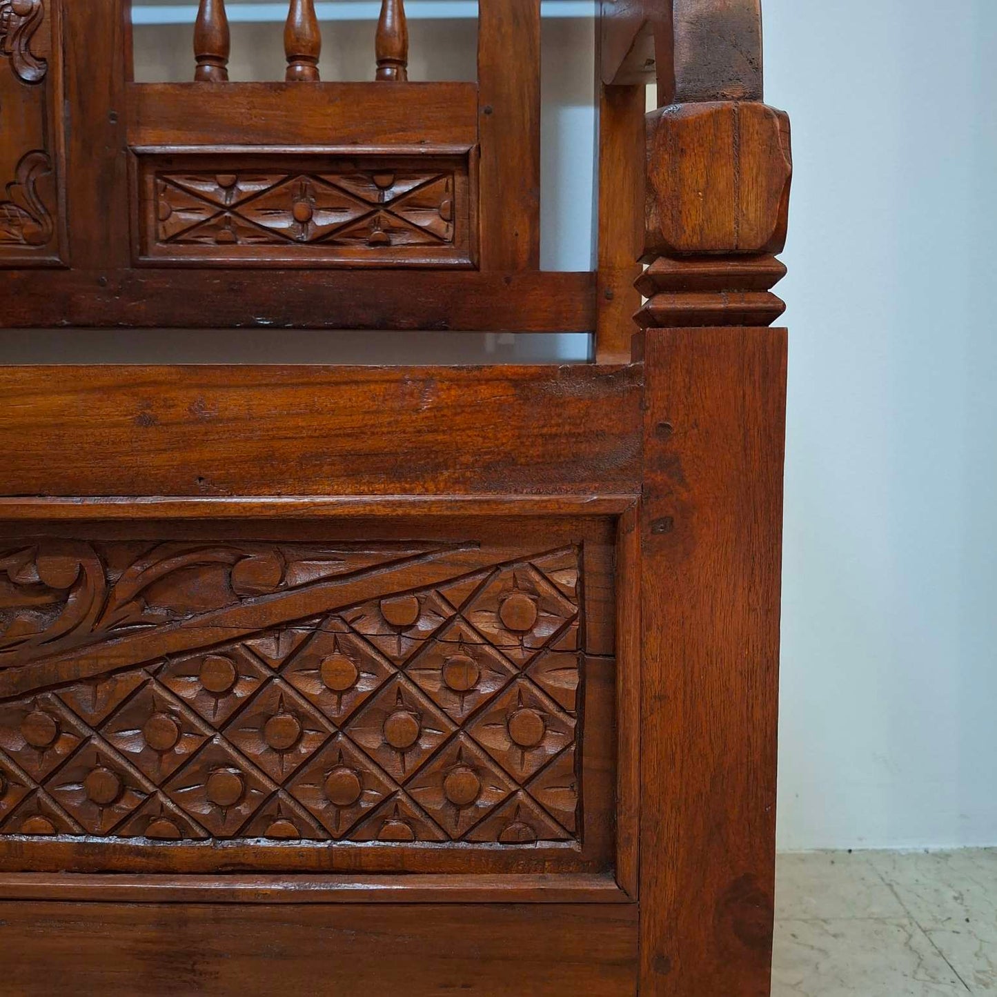 Ethnic sofa armchair with floral carvings