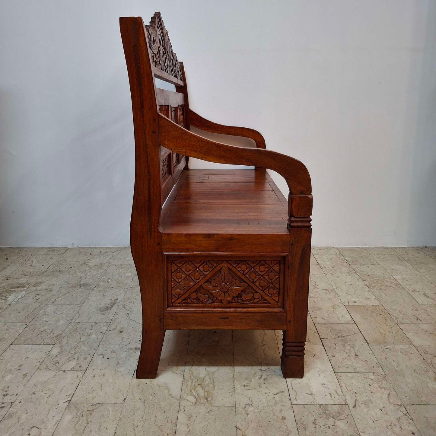 Ethnic sofa armchair with floral carvings