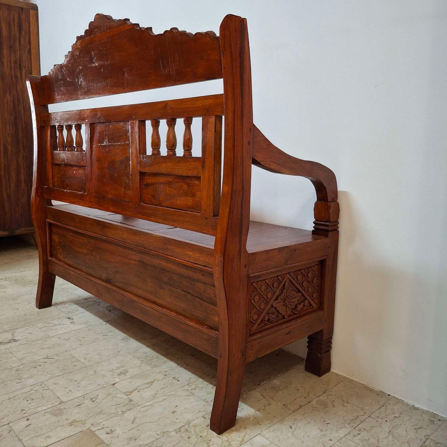 Ethnic sofa armchair with floral carvings