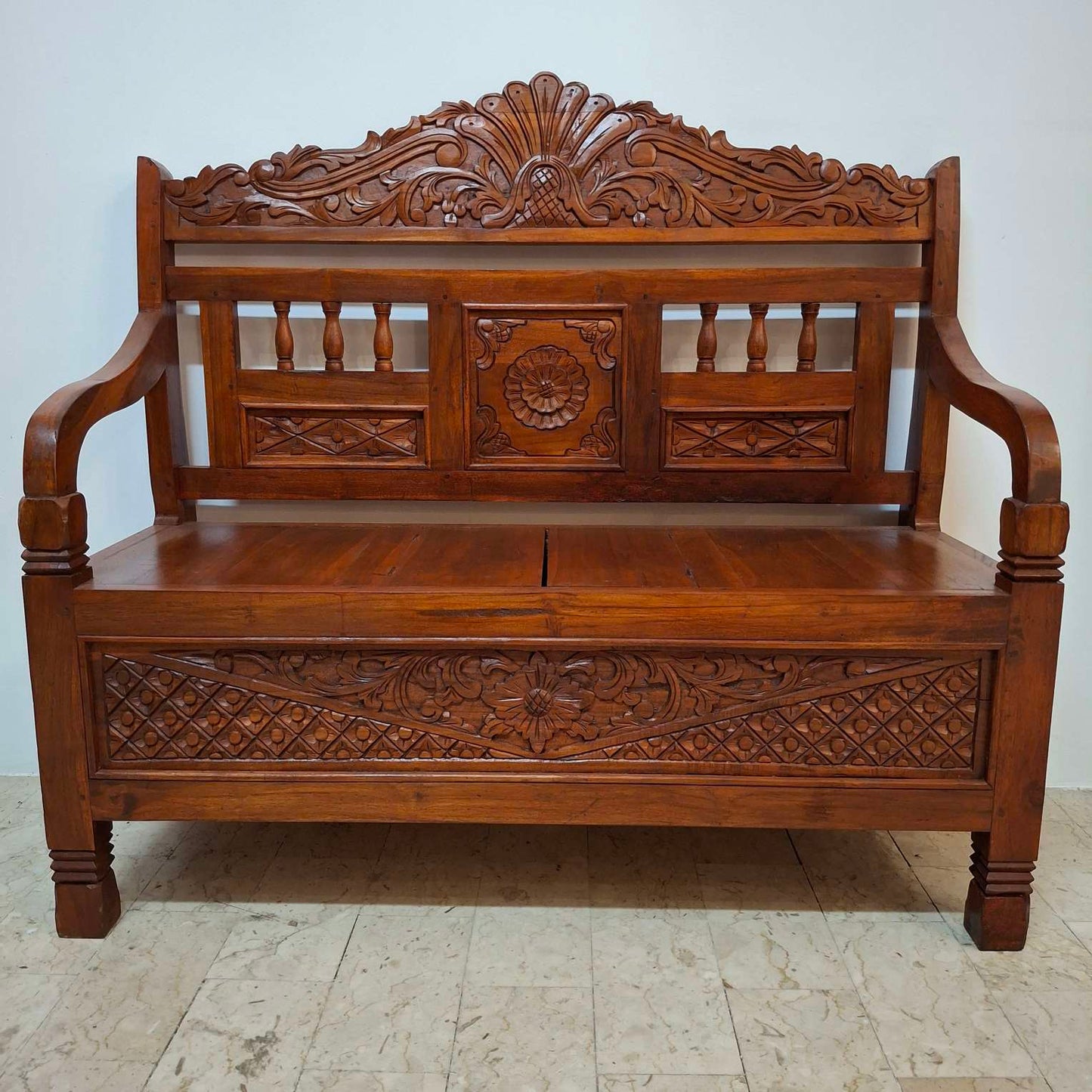 Ethnic sofa armchair with floral carvings