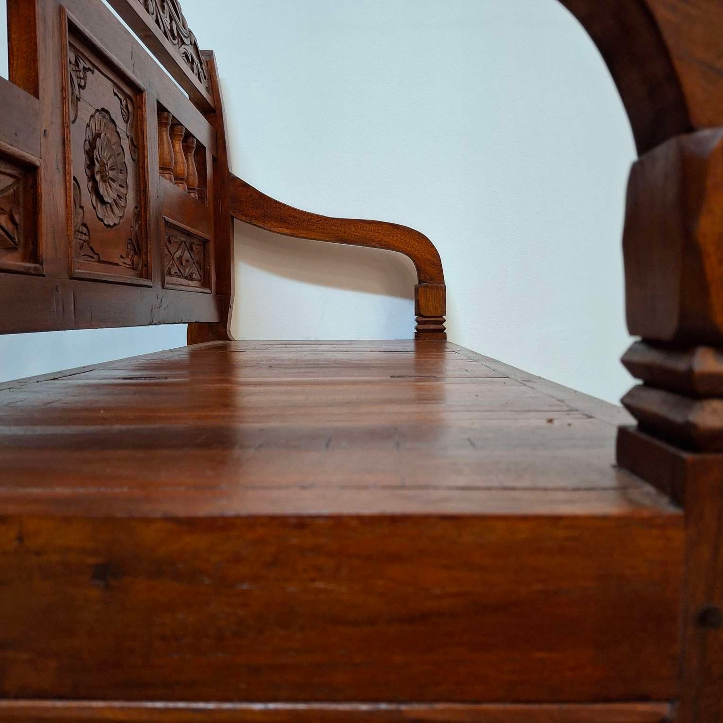 Ethnic sofa armchair with floral carvings