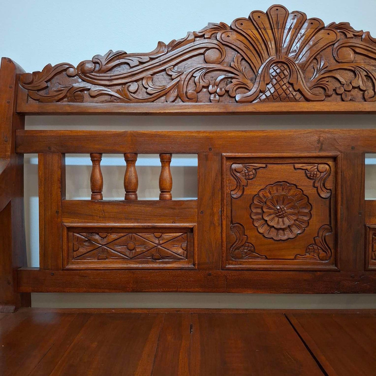 Ethnic sofa armchair with floral carvings