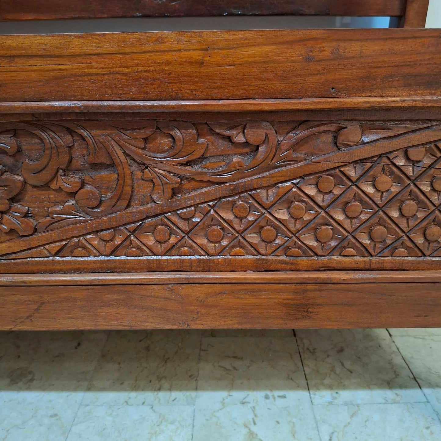 Ethnic sofa armchair with floral carvings