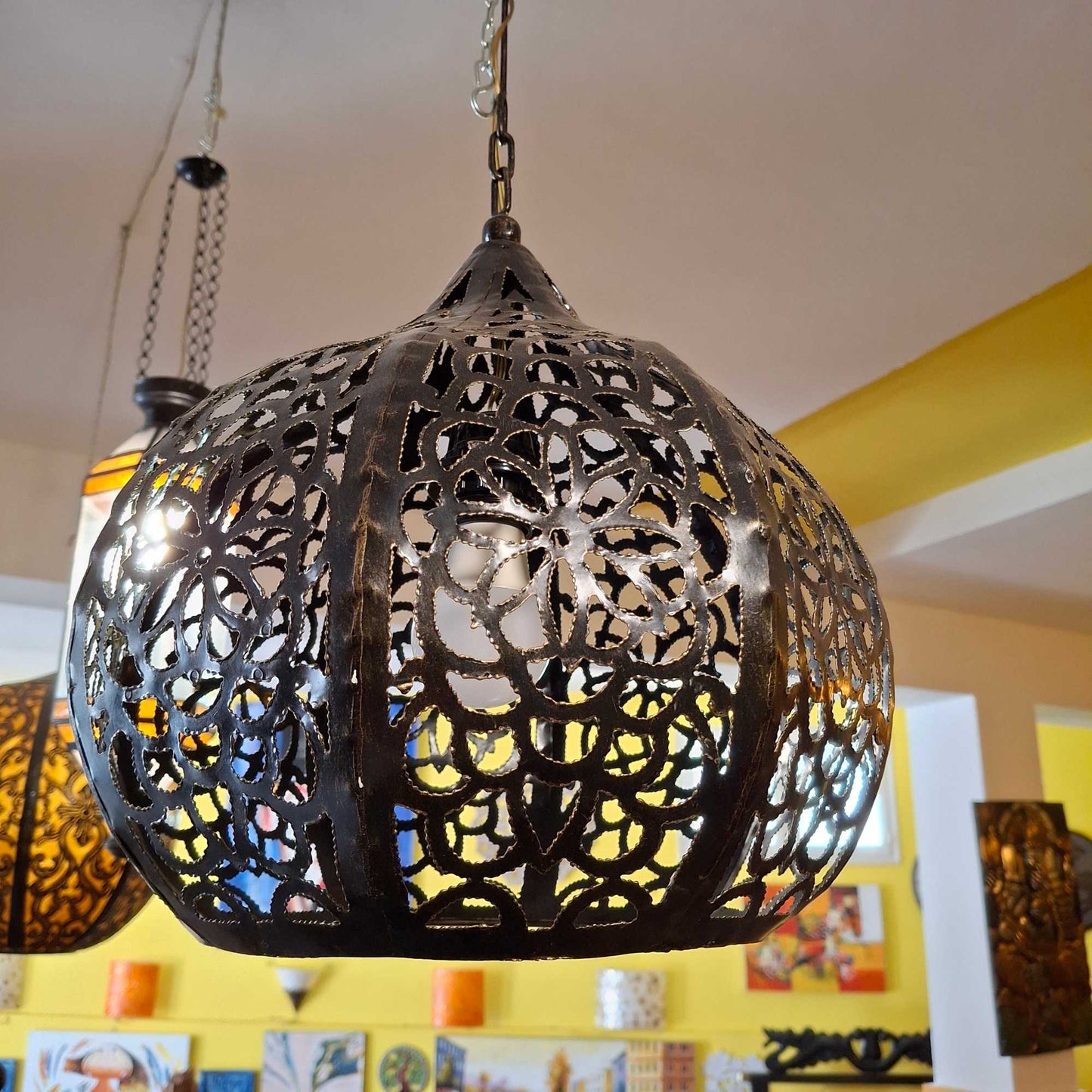 Ethnic wrought iron chandelier with floral design