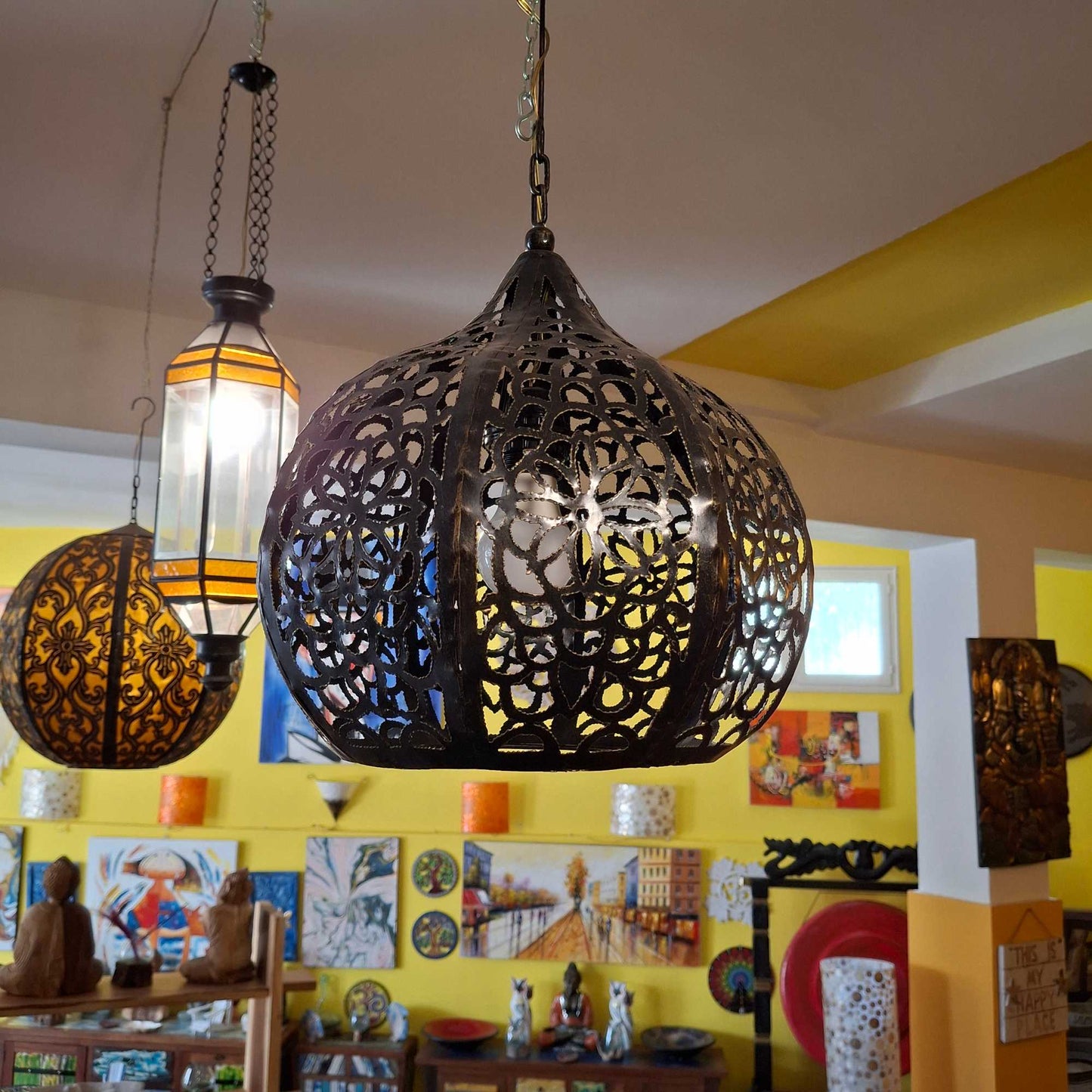 Ethnic wrought iron chandelier with floral design