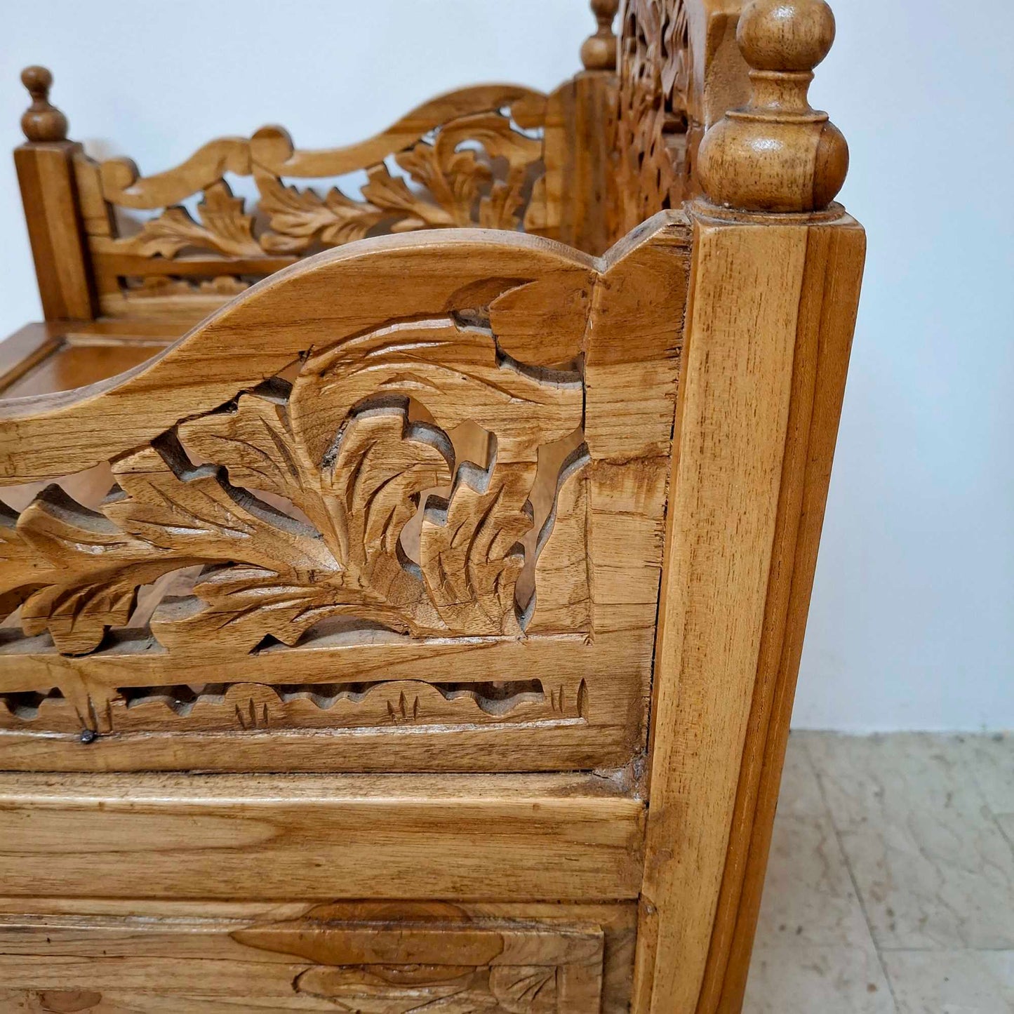Ethnic armchair carved in teak wood