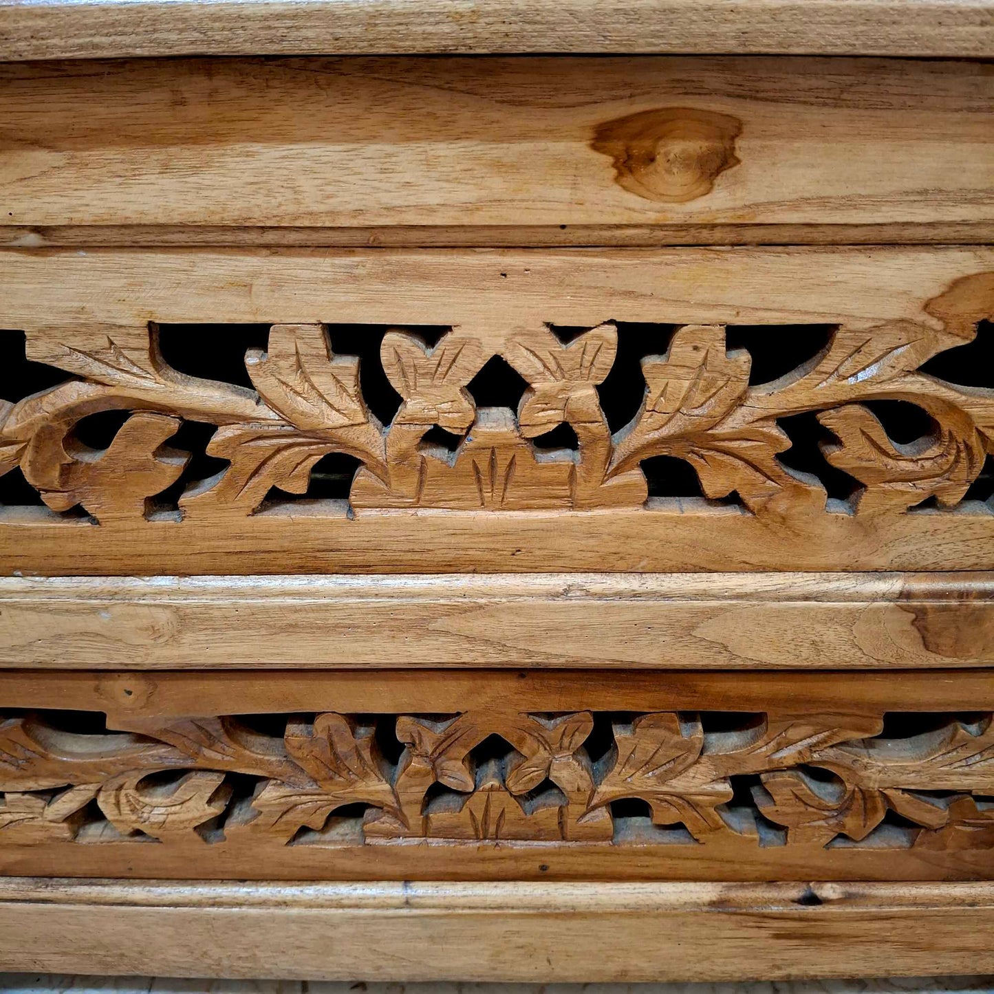 Ethnic armchair carved in teak wood