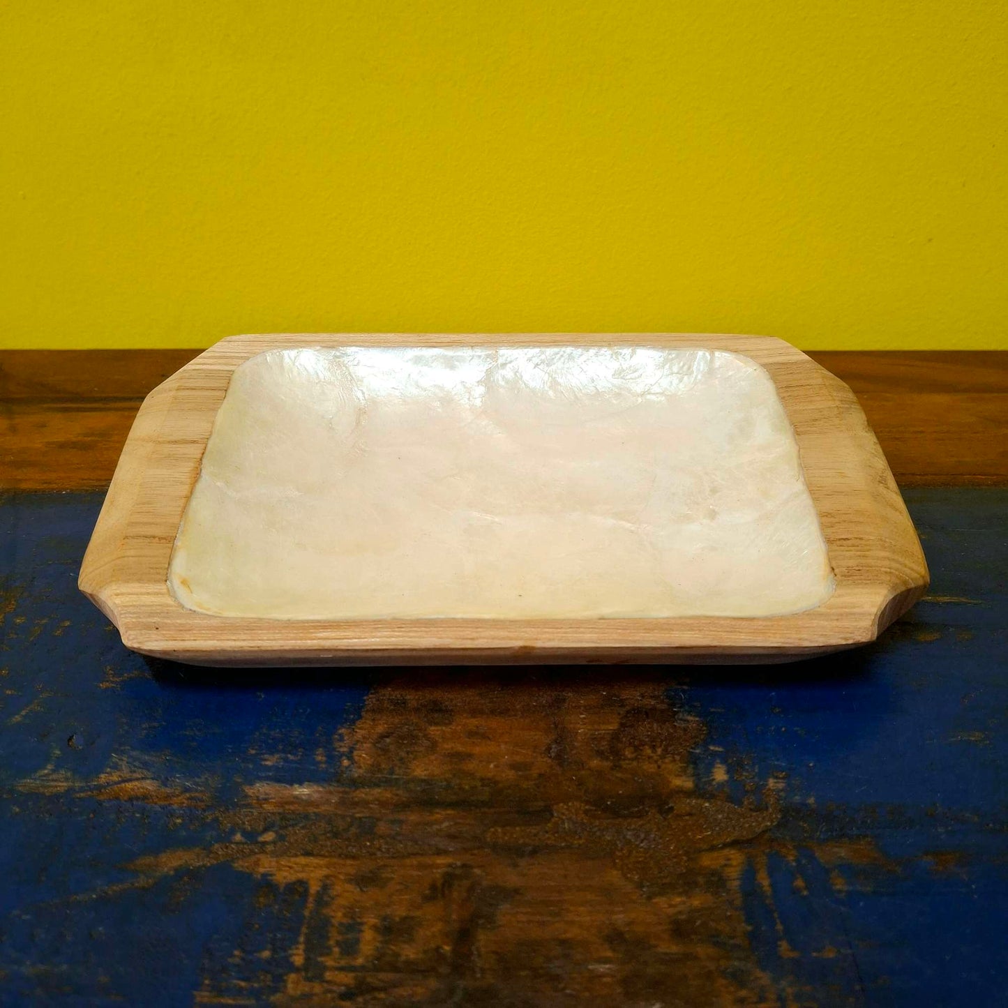 Set of wooden and mother of pearl trays to empty pockets