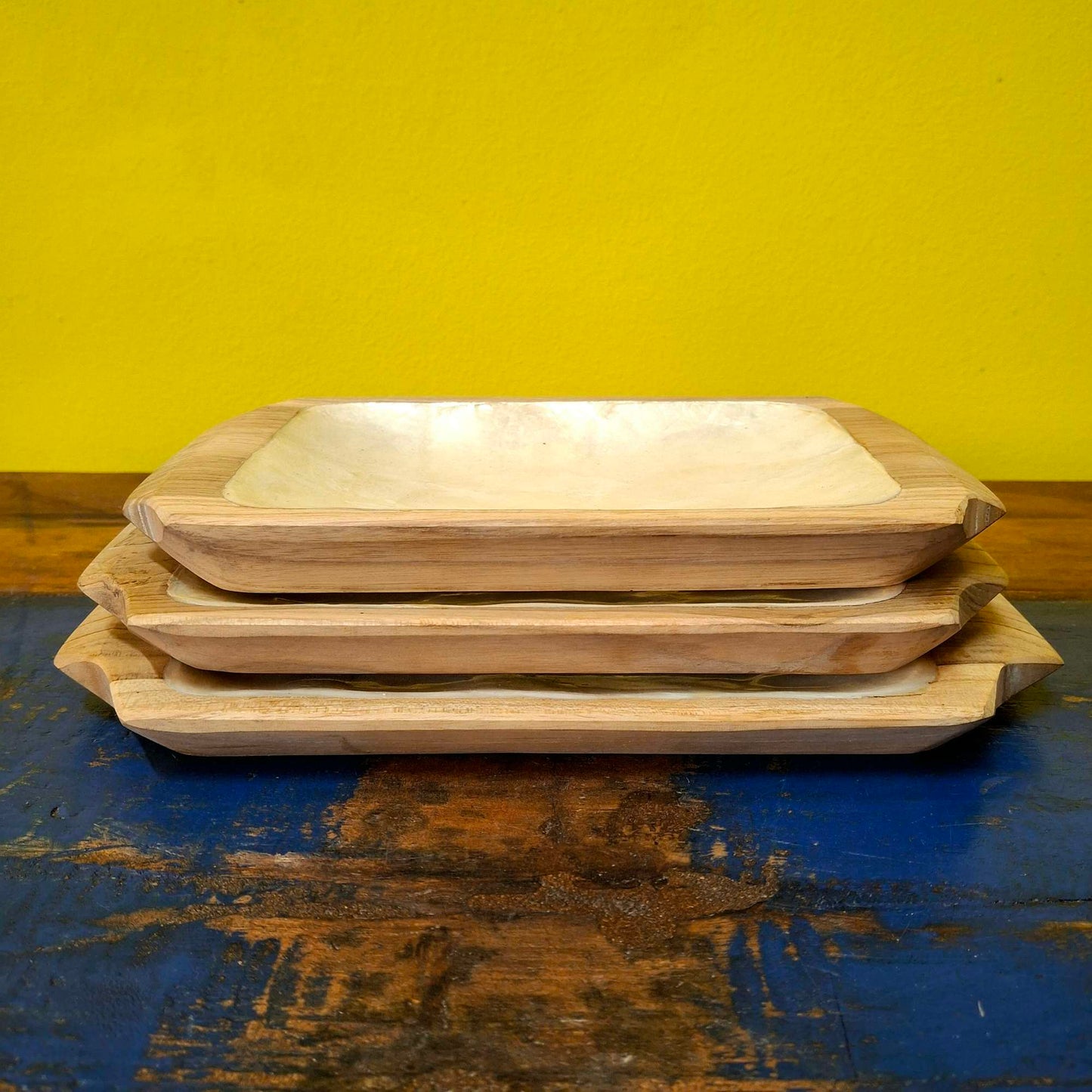 Set of wooden and mother of pearl trays to empty pockets