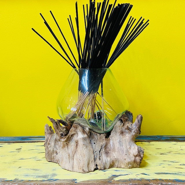 Fused glass vase on root ethnic decor