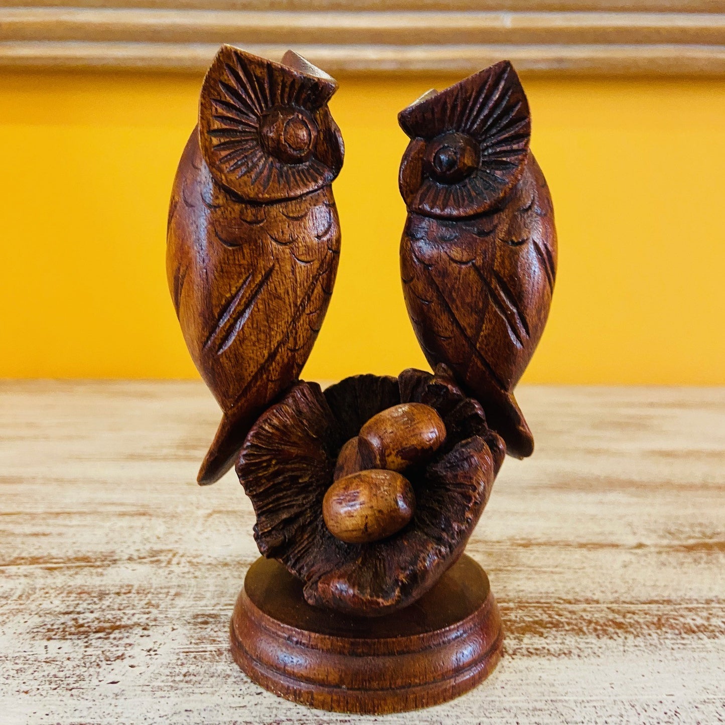 Owl family ethnic wood sculpture nest with eggs