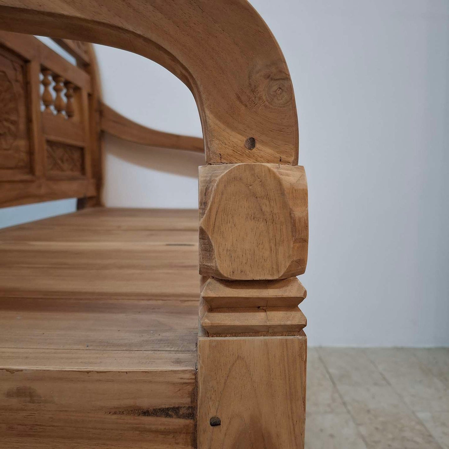 Container sofa with floral carvings