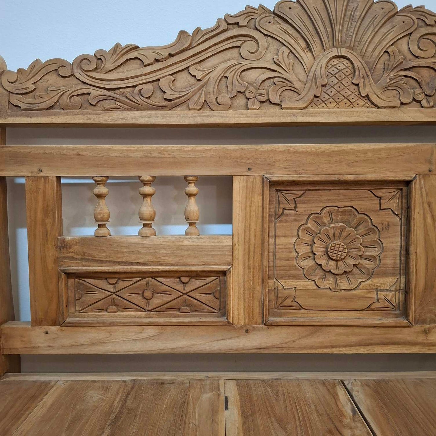 Container sofa with floral carvings