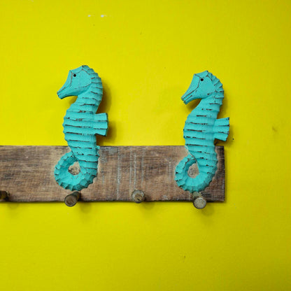 Ethnic seahorse coat hanger