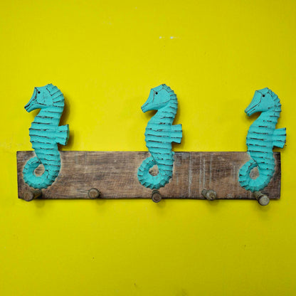 Ethnic seahorse coat hanger