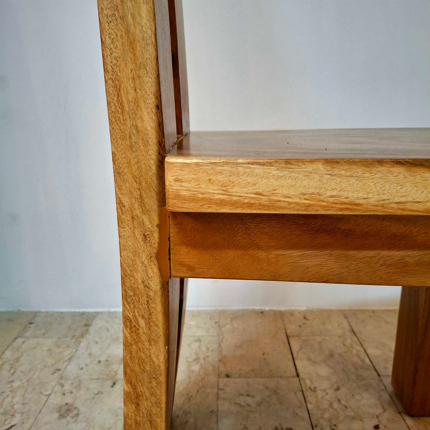 Chair made of a whole slice of solid Suar wood