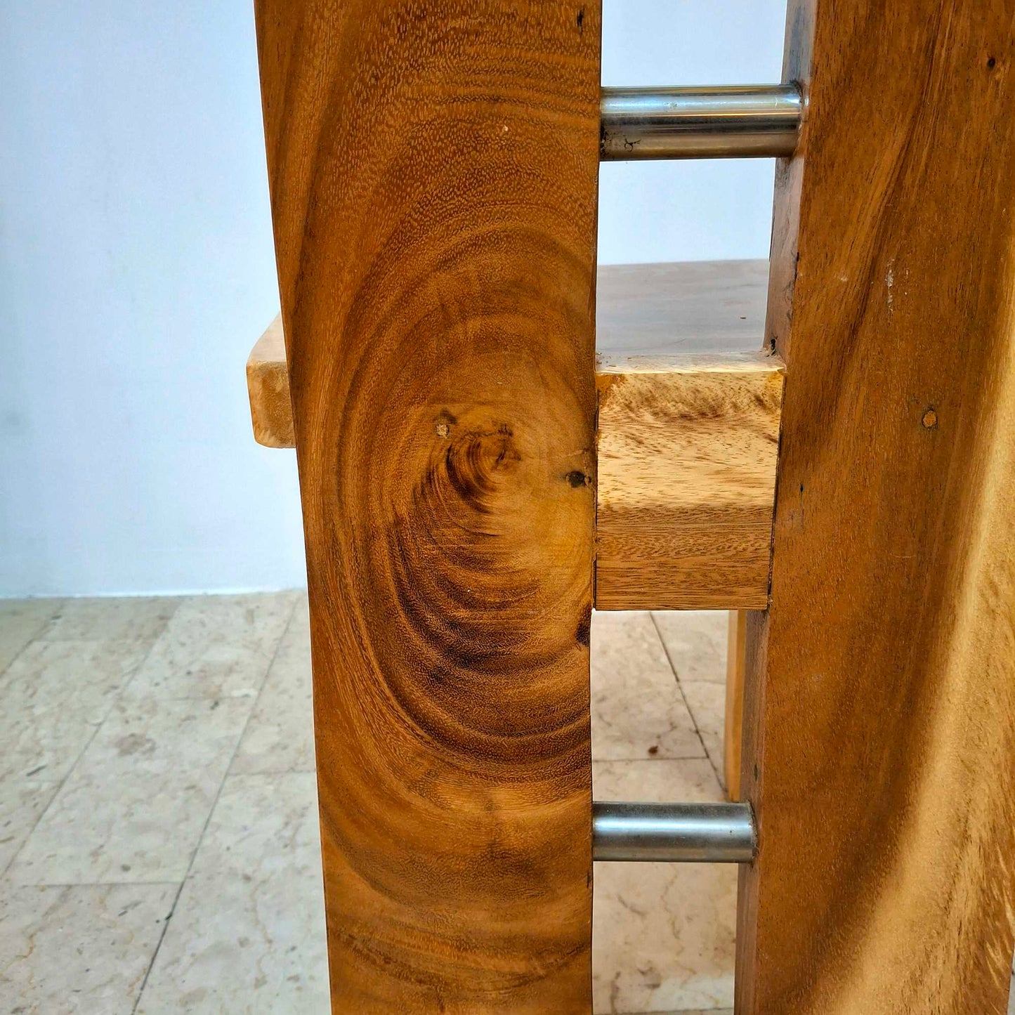 Chair made of a whole slice of solid Suar wood