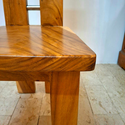 Chair made of a whole slice of solid Suar wood