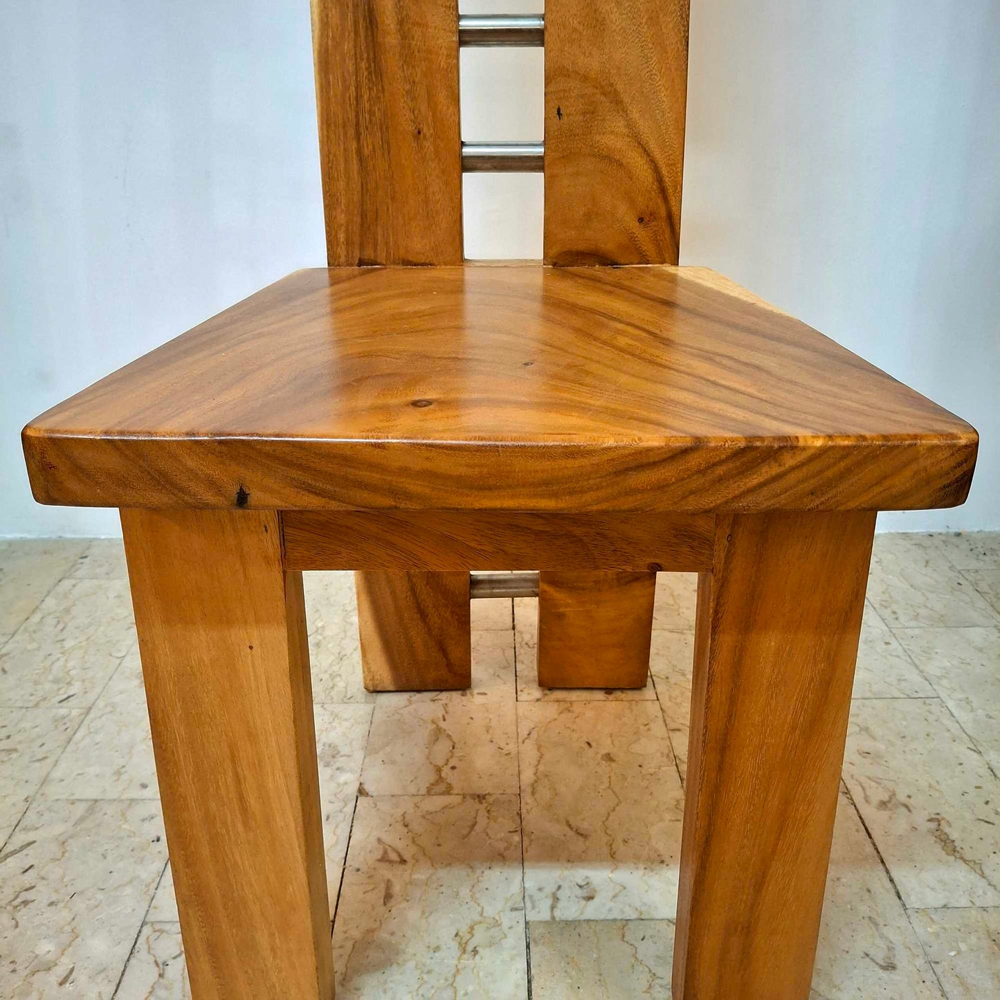 Chair made of a whole slice of solid Suar wood