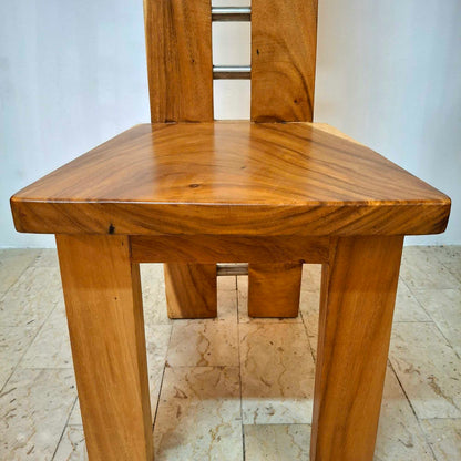 Chair made of a whole slice of solid Suar wood