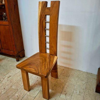 Chair made of a whole slice of solid Suar wood