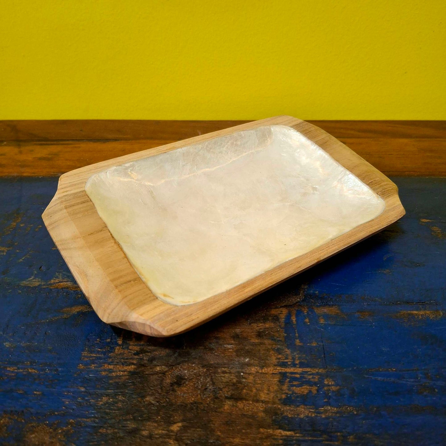 Set of wooden and mother of pearl trays to empty pockets