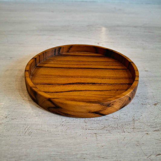Handcrafted coasters in natural teak wood