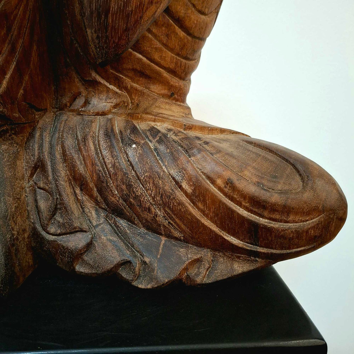 Wooden statuette suar sculpture sleeping Buddha