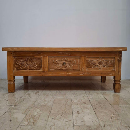 Teak wood coffee table with floral carvings
