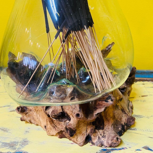 Fused glass vase on root ethnic decor