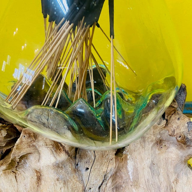Fused glass vase on root ethnic decor