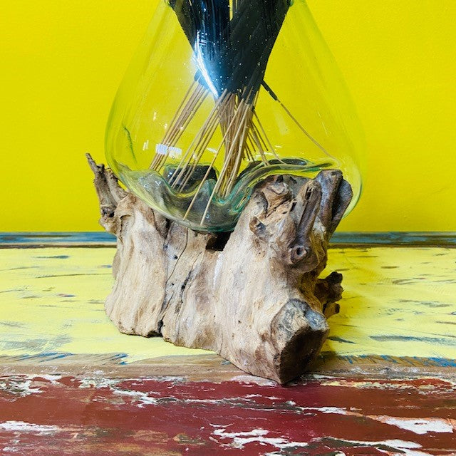Fused glass vase on root ethnic decor