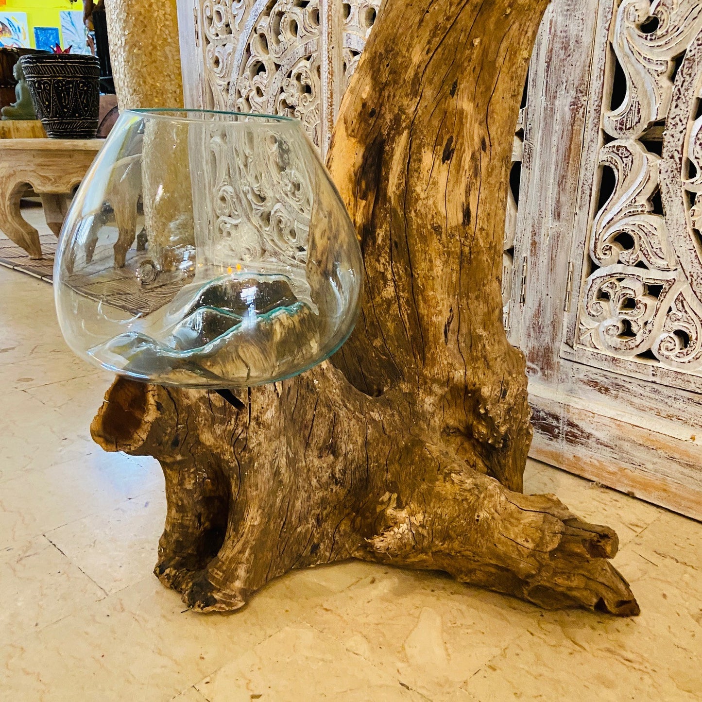Ethnic vase, aquarium, root and glass