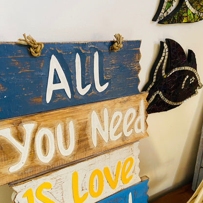 Ethnic wooden frame deco sign love and beach