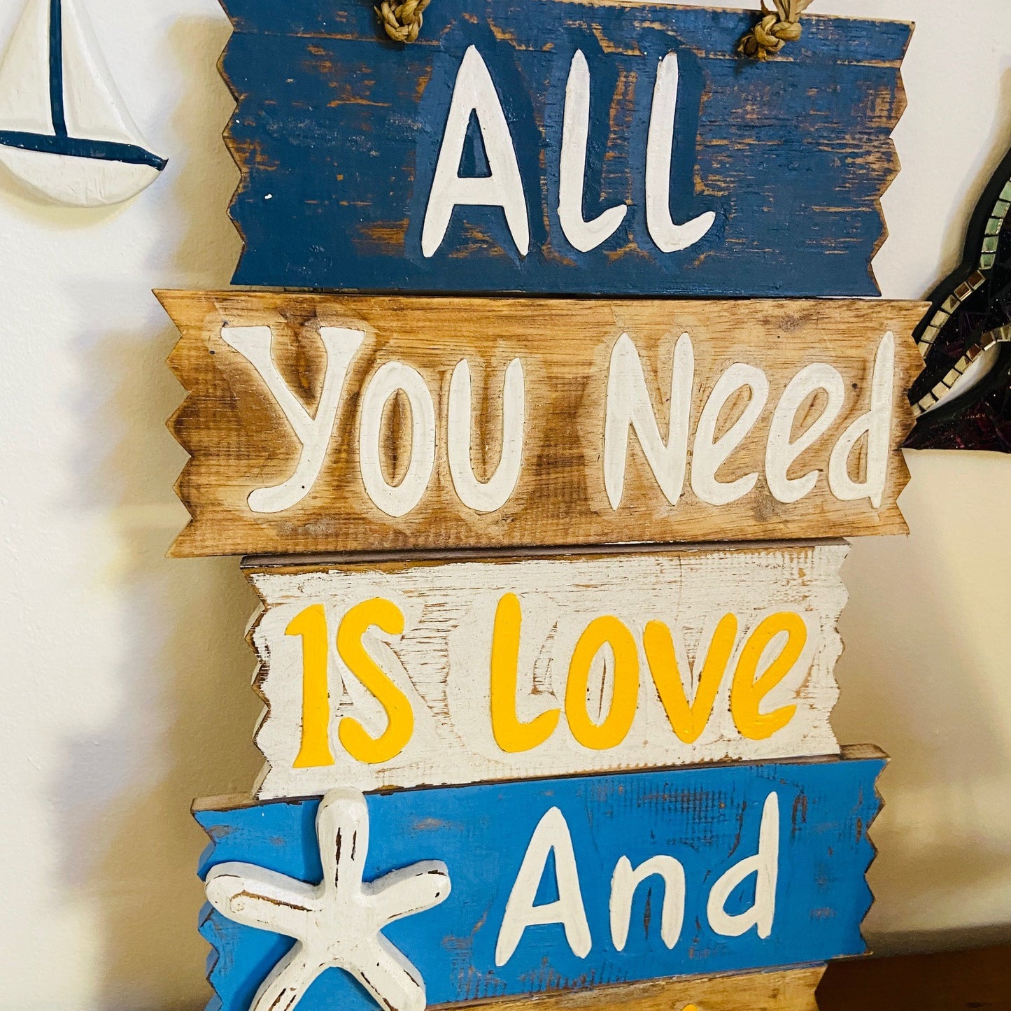 Ethnic wooden frame deco sign love and beach
