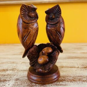 Famiglia gufi scultura legno etnica nido con uova